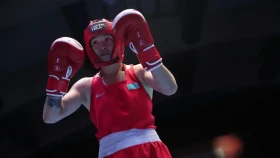 Назым Қызайбай жартылай финалда кіммен жұдырықтасады?